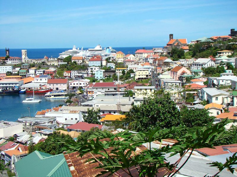 Grenada’s capital, St. George’s, borders the Caribbean with French and British colonial buildings along the Carenage, the horseshoe shaped inner harbor. 