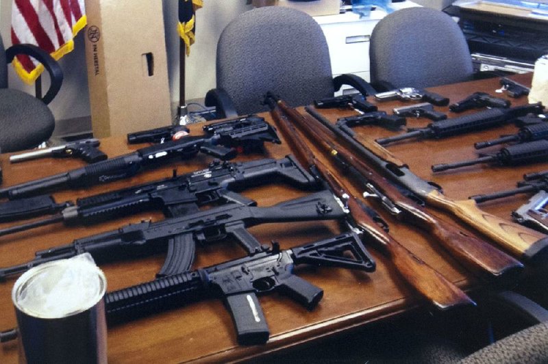 In an apartment search Friday, police in Prince George’s County, Md., found this cache of weapons and arrested a man accused of planning a workplace shooting. 