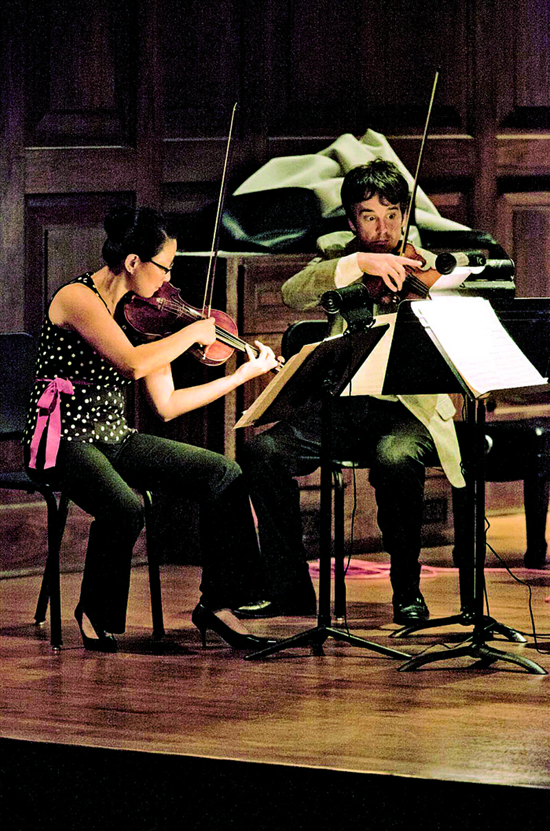 Violinists Joo Yun H. Preece (left) and Geoff Robson will teach and perform as part of the Faulkner Chamber Music Festival, Friday-Aug. 11 in Conway. 