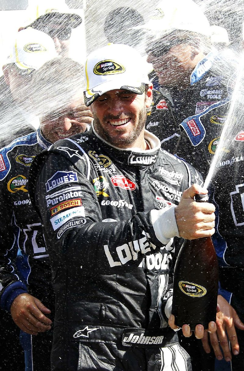 NASCAR Sprint Cup driver Jimmie Johnson had plenty to celebrate after winning Sunday’s Brickyard 400 at Indianapolis Motor Speedway in Indianapolis. It was Johnson’s fourth victory at Indy, leaving him tied with teammate Jeff Gordon for most at the track. 