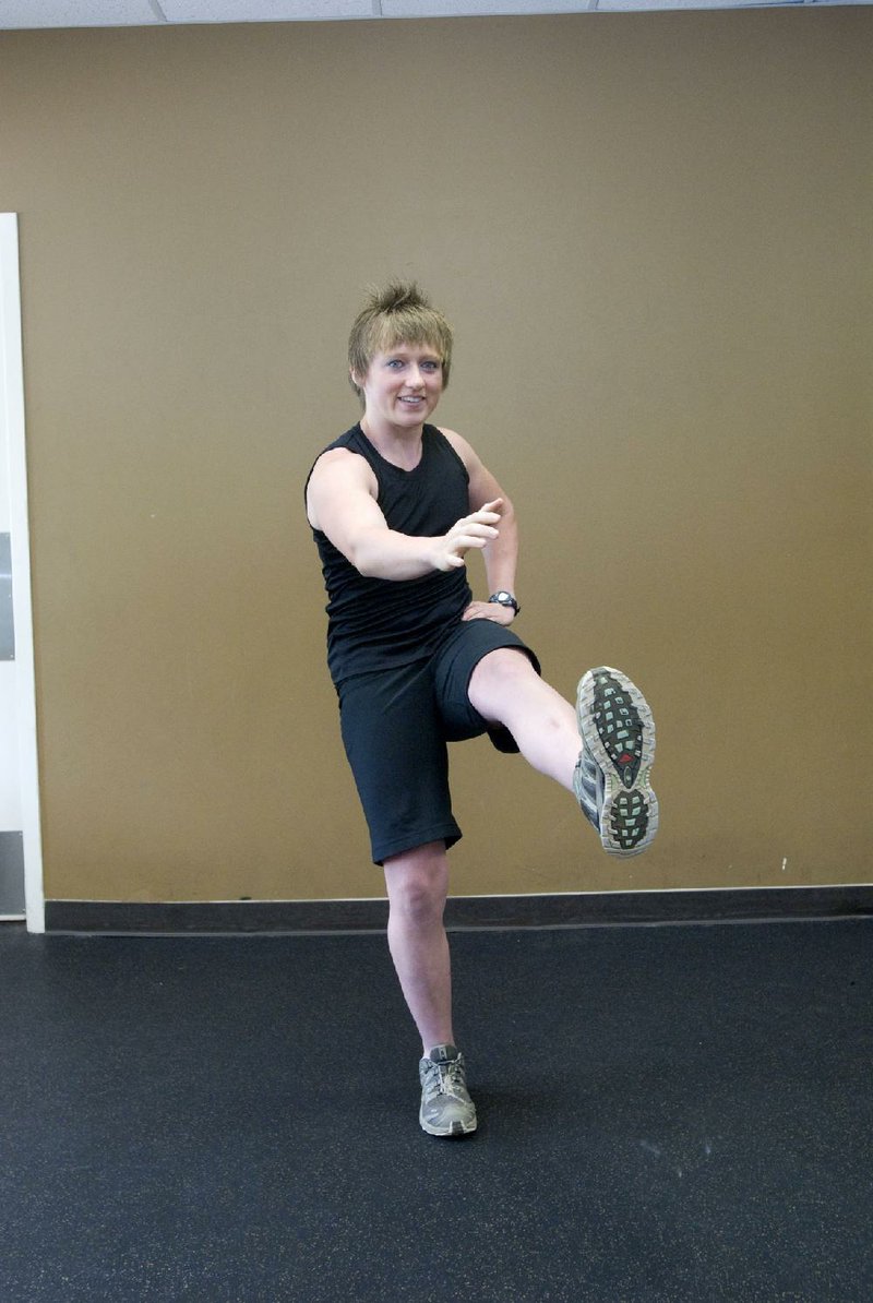 Rene Hooper does the Standing Quadruped, a goofy but effective warm-up for those who want to limber up their hips and back. 