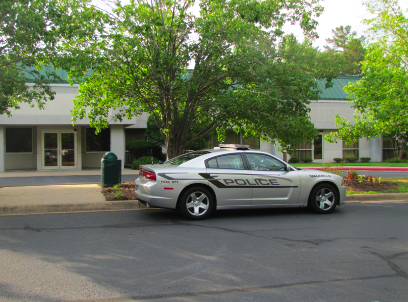 A Maumelle police car sits in front of Methodist Behavioral Hospital Tuesday morning.