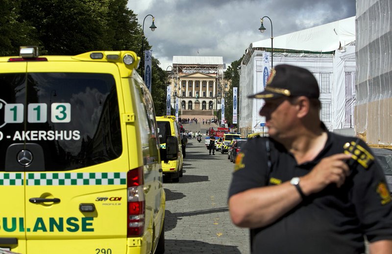 Police block off the area around the castle in Oslo, Norway, after U.S. Embassy security staff found a suspicious object beneath a nearby automobile Tuesday, July 31, 2012. 