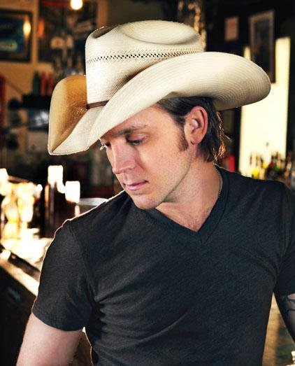 Justin Moore, native of Poyen, Arkansas,moved to Nashville, Tenn. to begin a music career after graduating high school in 2002. Moore received his break in 2008 when he signed with Big Machine Records and shortly after released his first single, ack That Thing Up.