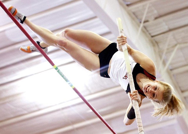 Pole vaulter Tina Sutej, a two-time national champion at Arkansas, will compete for her home country of Slovenia in Saturday’s qualifying round of the women’s pole vault in London. Forty women will compete in qualifying, with the top 12 making Monday’s final. 