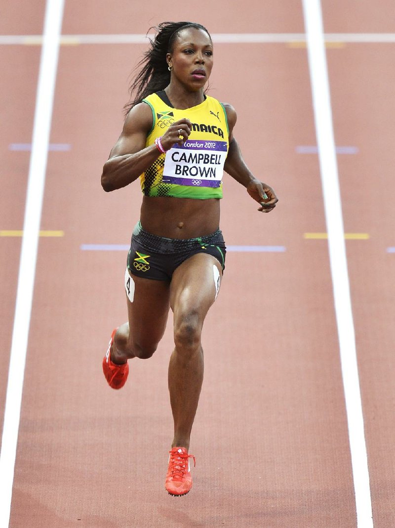 Former Arkansas sprinter Veronica Campbell-Brown, competing for her native Jamaica, won her 100-meter heat in 10.94 seconds to advance to today’s semifinals. 