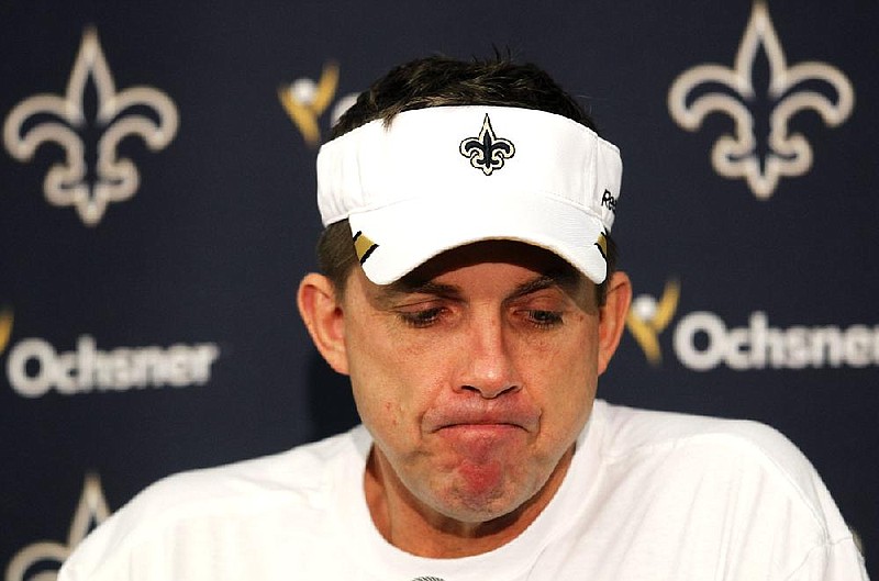 ADVANCE FOR WEEKEND OF JULY 21-22 - FILE - In this Jan. 17, 2012, file photo, New Orleans Saints head coach Sean Payton during his season-ending news conference at their NFL football training facility in Metairie, La. Payton is suspended for the 2012 season for his role in the bounty program an NFL investigation unveiled. (AP Photo/Gerald Herbert, File)
