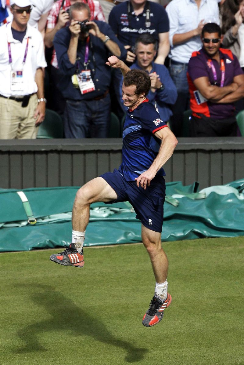 Britain’s Andy Murray (above) won his Wimbledon rematch with Switzerland’s Roger Federer 6-2, 6-1, 6-4 in the men’s singles gold-medal match on Sunday. 