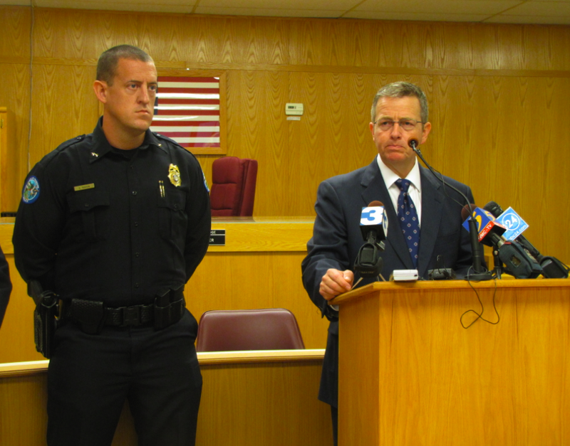 Prosecutor Scott Ellington speaks beside Trumann Police Chief Chad Henson during a news conference Tuesday.