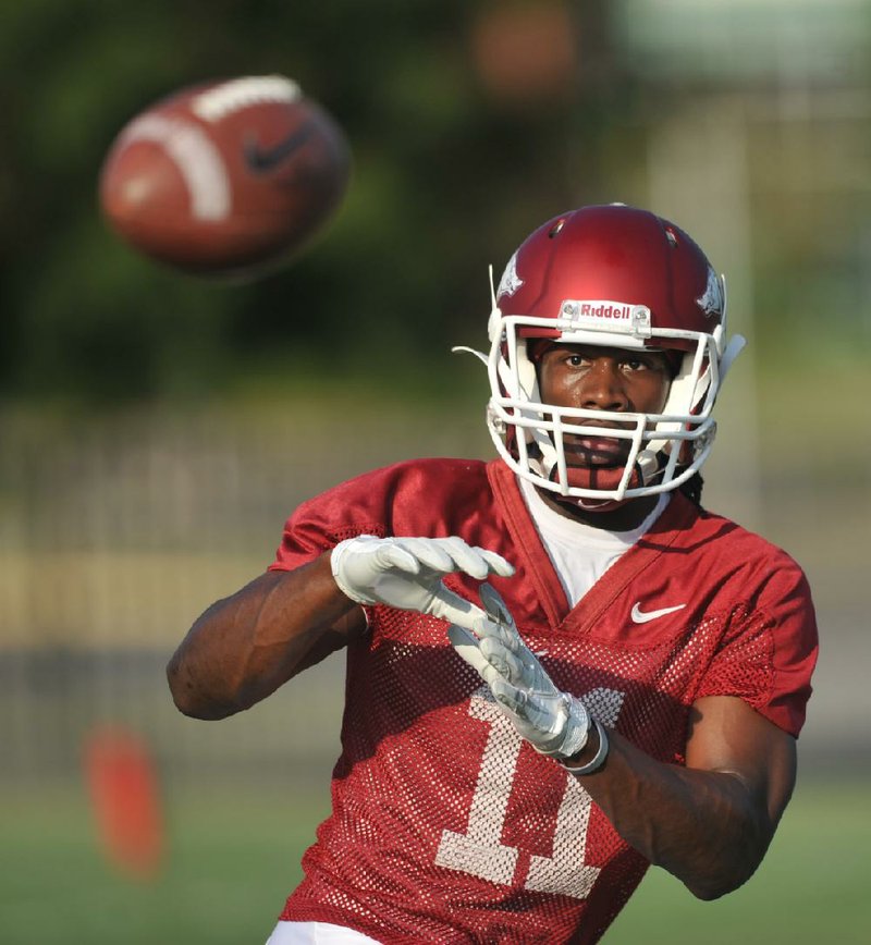 Arkansas receiver Cobi Hamilton and cornerback Tevin Mitchel have produced perhaps the most competitive pairing during the Razorbacks’ camp. “He’s going to win some, I’m going to win some,” Hamilton said. “Hopefully I win a lot more than he does.” 