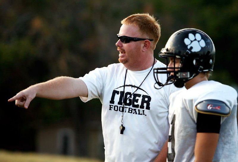 Arkansas Democrat-Gazette/JASON IVESTER --08/08/11--
Charleston High School football
head coach Doug Loughridge