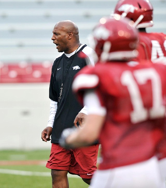 New defensive schemes from Arkansas defensive coordinator Paul Haynes (above) have kept the Hogs’ offense on its toes. 