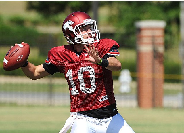 Redshirt freshman Brandon Allen of Fayetteville passed for more than 10,000 yards in his high school career and completed 38 touchdown passes with no regular season interceptions in 2010, but has yet to throw a pass in a college football game. Video available at arkansasonline.com/videos. 