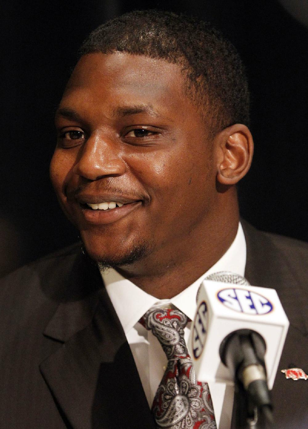 Arkansas defensive end Tenarius Wright speaks to the media at the Southeastern Conference NCAA college football media day in Hoover, Ala. on Wednesday, July 18 , 2012. (AP Photo/Butch Dill)