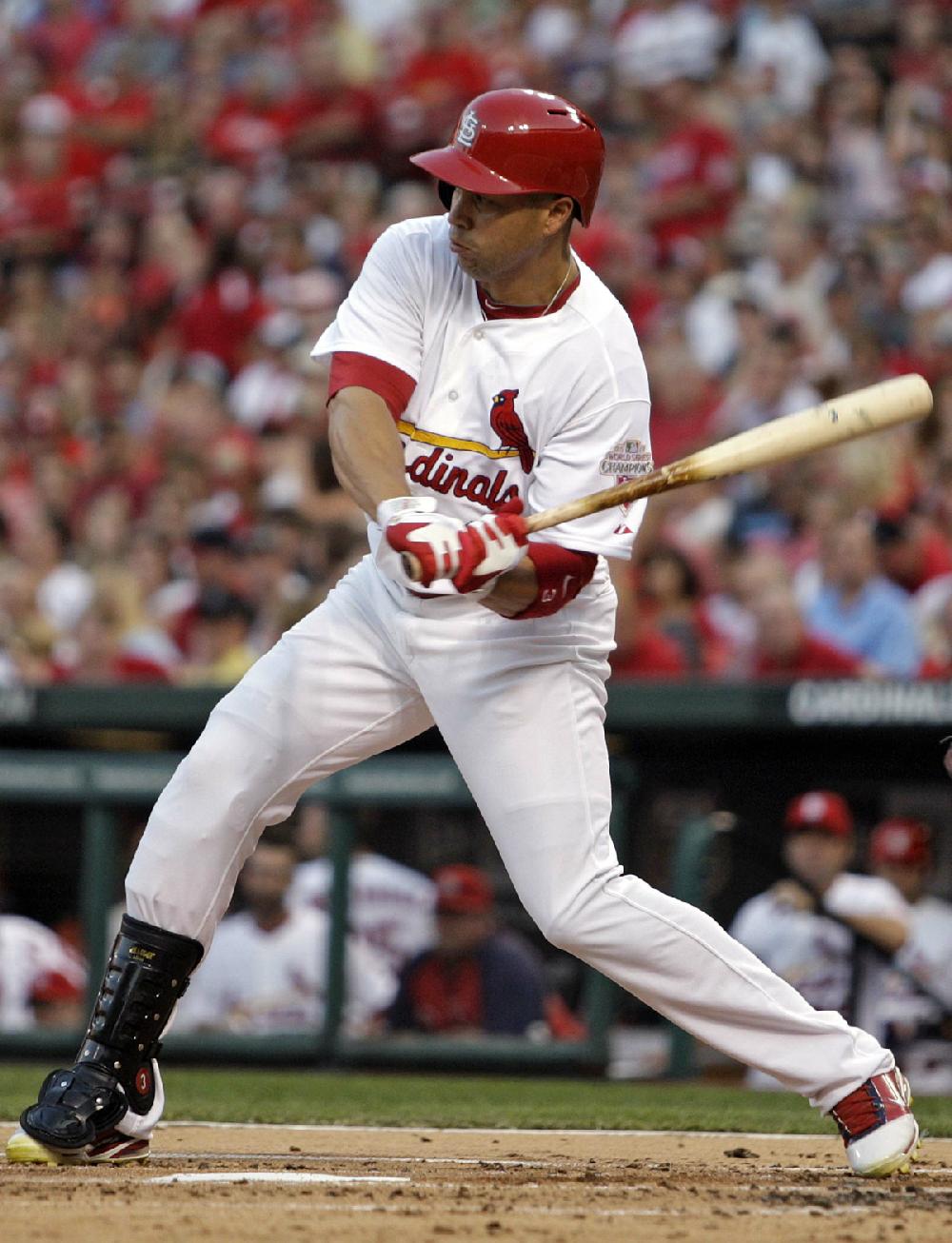 St. Louis Cardinals' Carlos Beltran (3) swings for a solo home run in the second inning of a baseball game against the San Francisco Giants, Monday, Aug. 6, 2012 in St. Louis. (AP Photo/Tom Gannam)
