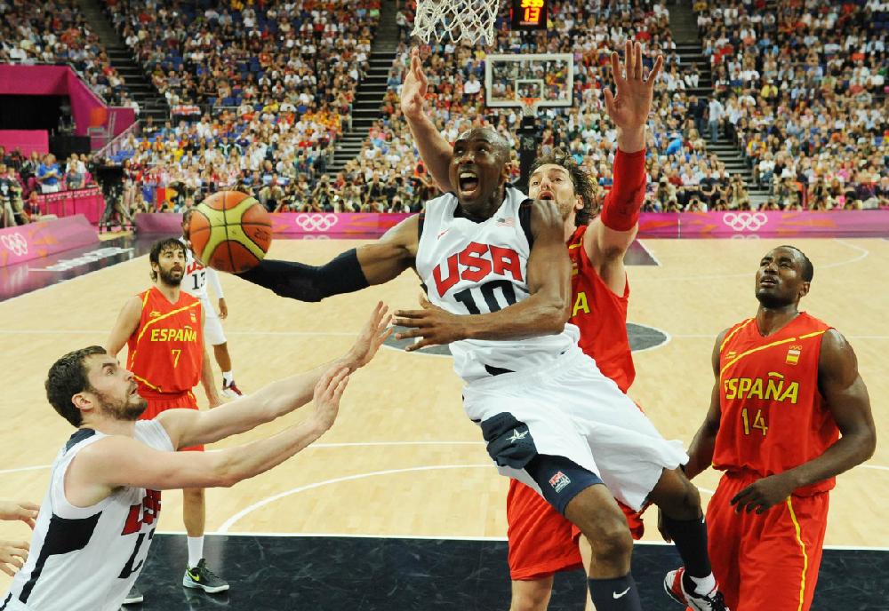 The United States' Kobe Bryant jumps to score during the men's gold medal basketball game at the 2012 Summer Olympics in London on Sunday, Aug. 12, 2012. (AP Photo/Mark Ralston, Pool)