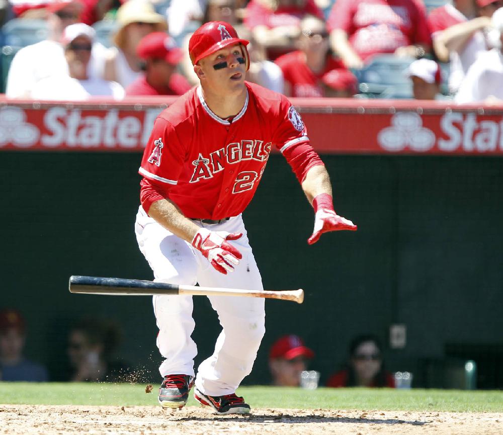 Los Angeles Angels' Mike Trout hits a solo home run against the Tampa Bay Rays during the fourth inning of their baseball game in Anaheim, Calif., Sunday, Aug. 19, 2012. (AP Photo/Alex Gallardo)