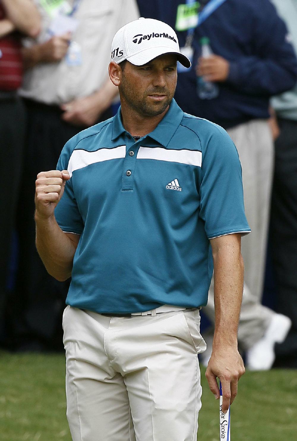 Sergio Garcia, of Spain, pumps a fist after a putt on the 18th green during the final round of the Wyndham Championship golf tournament in Greensboro, N.C., Monday, Aug. 20, 2012. Garcia claimed a two-stroke victory in the rain-delayed event to earn his first PGA Tour victory since the 2008 Players Championship.(AP Photo/Gerry Broome)