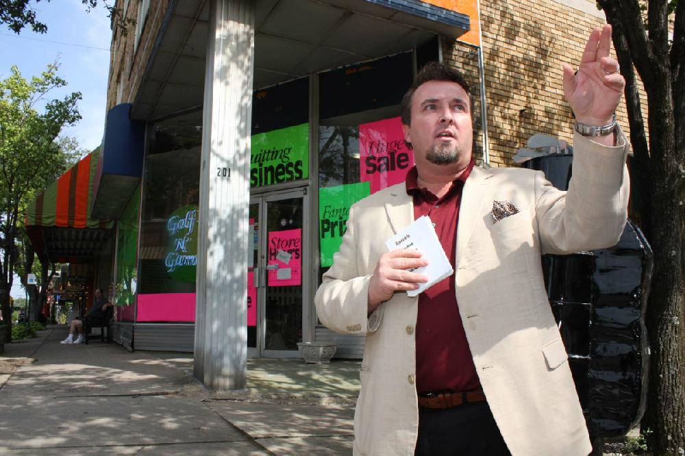 Arkansas Democrat-Gazette/ BOBBY AMPEZZAN --8/16/12-- Mark Givens, Main Street El Dorado director, outside a soon to be vacated corner space.