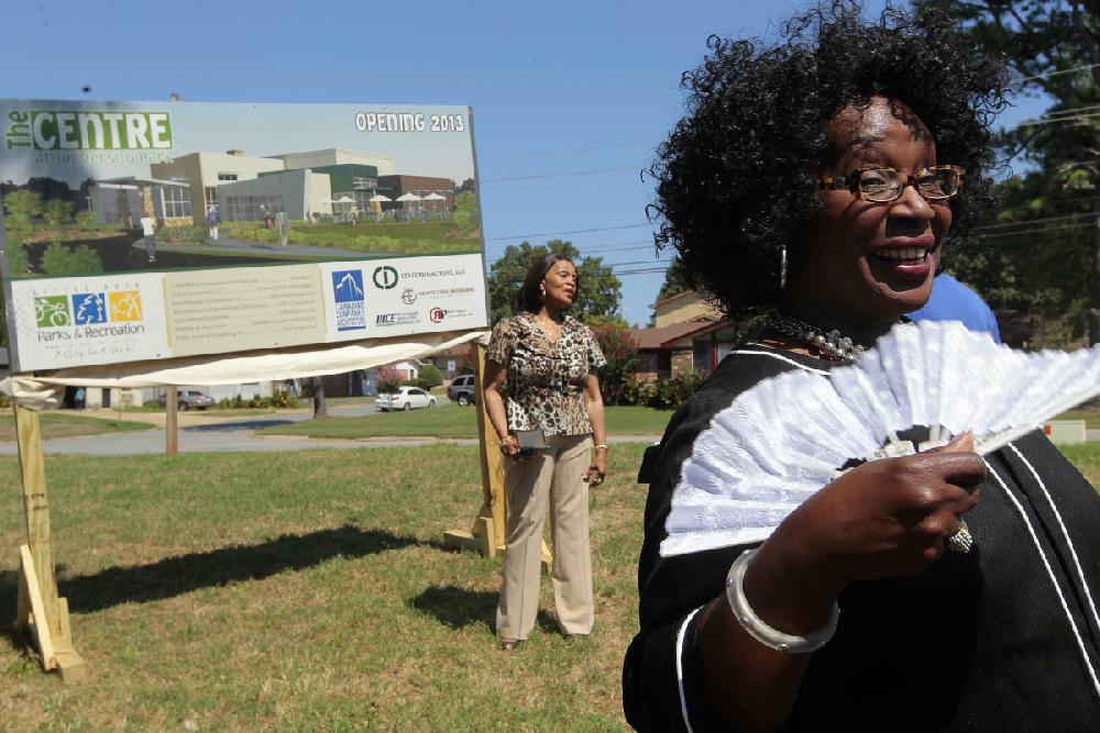 Arkansas Democrat-Gazette/BENJAMIN KRAIN --8/20/2012--
Doris Wright, right, Little Rock City Director Ward 8, and Eleanor Coleman, center, University Park Neighborhood Association member, participate with other city officials and residents in a groundbreaking ceremony for Little Rock’s new Community Center in the University Park neighborhood. The Centre at University Park will be a modern and useful replacement for the former Adult Leisure Center building that burned down in 2009. The new Center will be approximately 15,000 square feet, with a larger ball room, meeting rooms, webinar room, pottery and crafts room at a cost of approximately $3,000,000 funded by insurance proceeds and recently passed tax measure. The construction time is expected to be eight months.