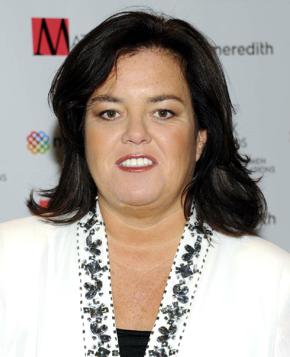 FILE - In this April 11, 2011 file photo, television personality Rosie O'Donnell attends the New York Women in Communications' 2011 Matrix Awards in New York. O'Donnell said on her blog, Monday, Aug. 20, 2012, that she's ucky to be hereafter suffering a heart attack last week. (AP Photo/Evan Agostini, file)