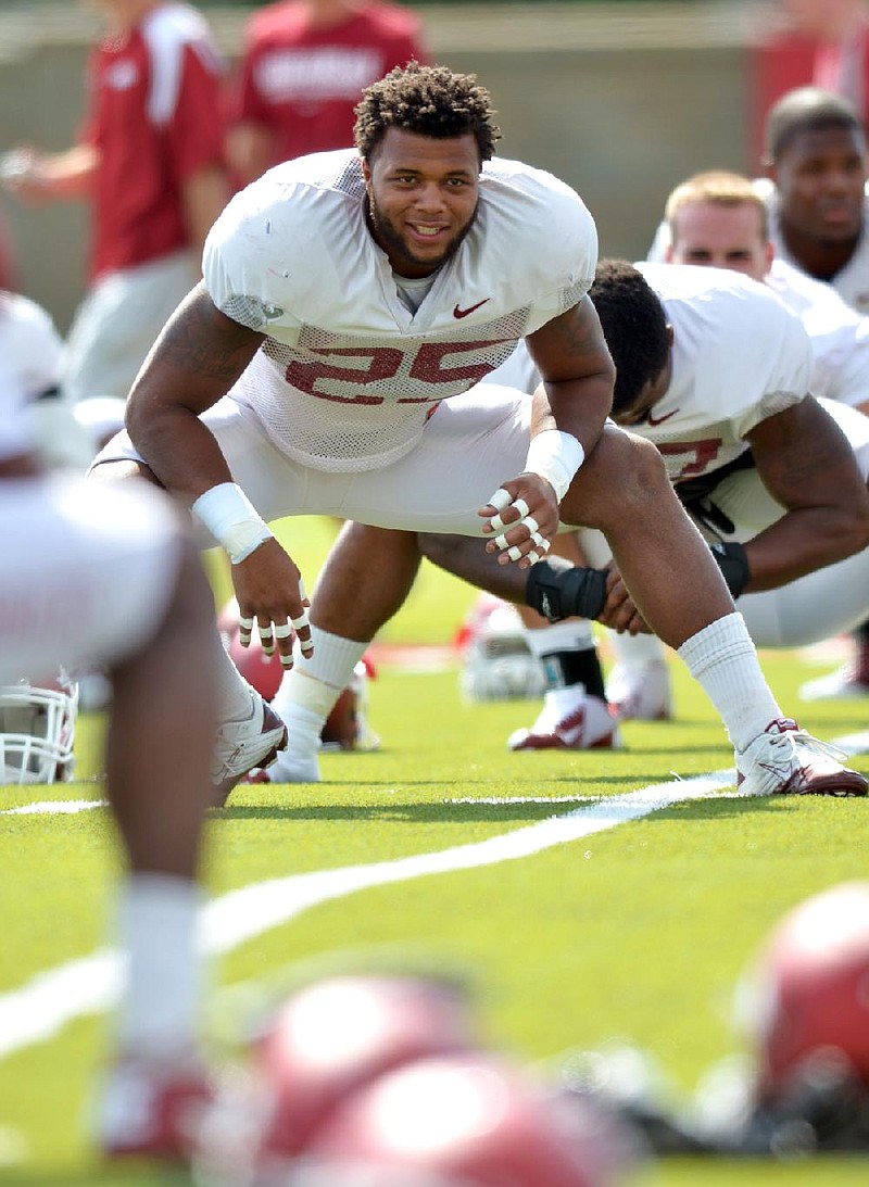 STAFF PHOTO MICHAEL WOODS  --08/21/2012--  University of Arkansas defender Terrell Williams warms up during practice Tuesday afternoon at the University of Arkansas in Fayetteville.