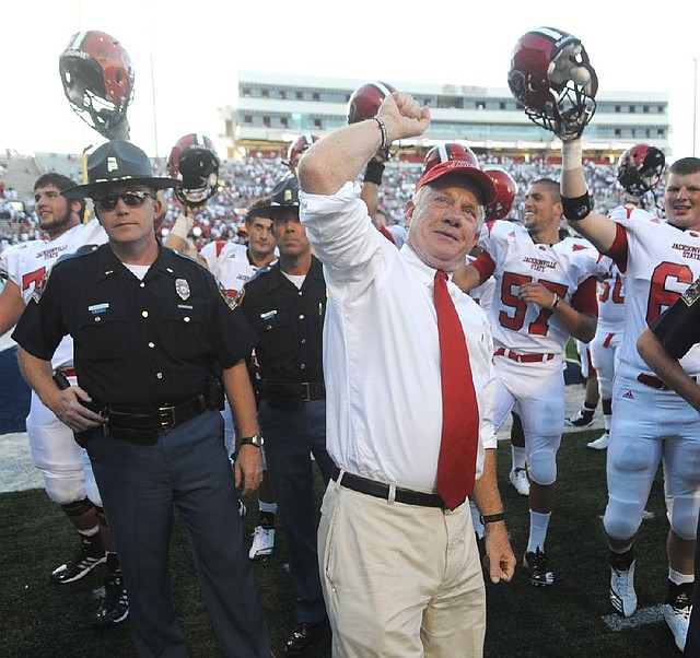 Jack Crowe, 65, will begin his 13th season as Jacksonville State’s coach on Saturday night when the Gamecocks play Arkansas at Reynolds Razorback Stadium. He is shown here celebrating after a win in 2010.