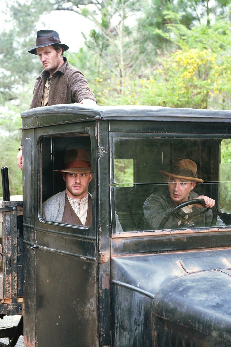 Howard (Jason Clarke), Forrest (Tom Hardy) and Jack (Shia LaBeouf) are the bootlegging Bondurant brothers in John Hillcoat’s Depression-era crime drama Lawless. 