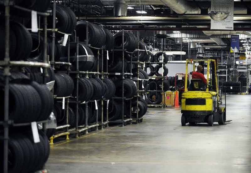 A forklift driver takes inventory into the warehouse at a Michelin tire plant in Greenville, S.C., in July. Factory orders rose 2.8 percent in July, the Commerce Department said Friday. 