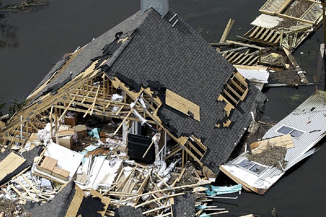 A view of the destruction visited by Hurricane Isaac on a home is offered in this aerial photo taken Friday over Yscloskey, La. 