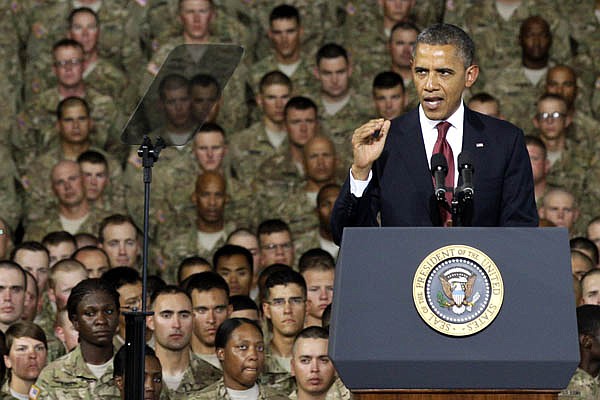 President Barack Obama speaks to troops, servicemen and military families Friday at the 1st Aviation Support Battalion Hangar at Fort Bliss in El Paso, Texas. 