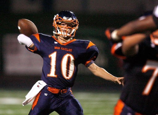 STAFF PHOTO JASON IVESTER -- Rogers Heritage junior Josh Qualls attempts a pass against Fort Smith Northside during the first half on Friday, Sept. 7, 2012, at David Gates Stadium in Rogers.