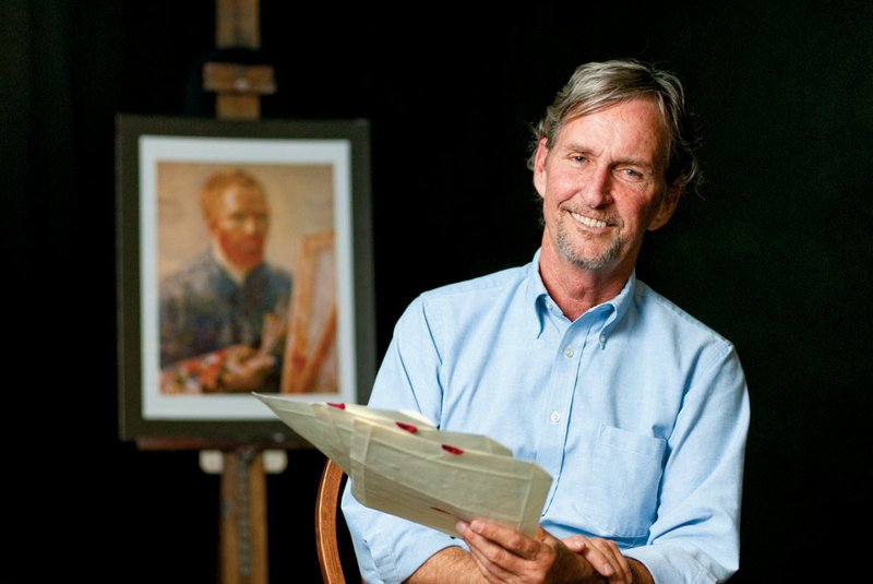 Tom McLeod of Conway, executive director of the Conway Community Arts Association, holds some props as he stands next to a portrait of artist Vincent van Gogh at The Lantern Theatre in downtown Conway. McLeod is presenting a one-man show, Vincent, written by Leonard Nimoy and told by van Gogh’s brother, Theo, through hundreds of letters that Vincent van Gogh wrote to his brother. More information is available at www.conwayarts.org.