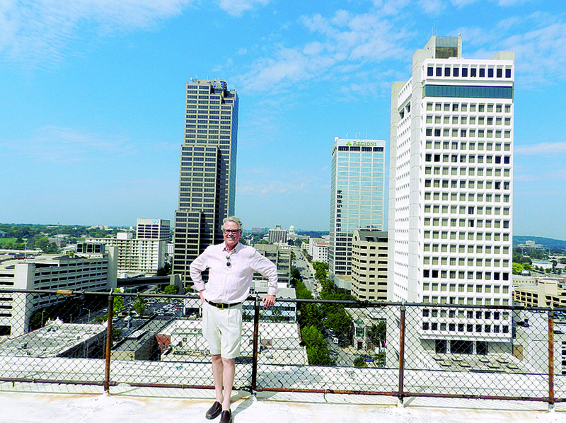 Wooten Epes, a partner in Main Street Lofts LLC, stands atop the Boyle Building on Friday. 