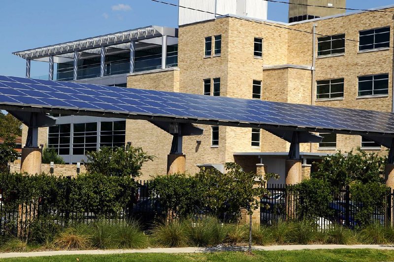 The solar panels installed on a state office building at 900 W. Capitol Ave. in Little Rock began supplying power Tuesday after a legal issue was resolved between the Arkansas Building Authority and the state Public Service Commission. 