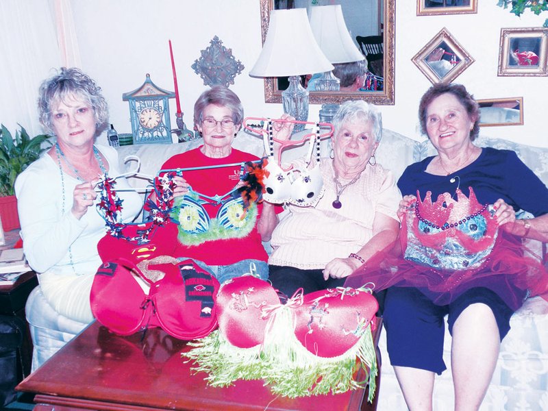 The Roadrunners Extension Homemakers Club is sponsoring a Bra Art Extravaganza. Entry forms for the bra-decorating contest will be available at the Faulkner County Fair and other upcoming events. Planning the extravaganza are, from left, Sandi Zimmerman of Conway; and Marie Wilson, Alice Brown and Shelby Wilcox, all of Greenbrier.