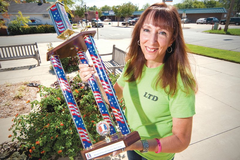 Cj Conine is a clogging instructor who leads LTD Edition Cloggers, a group that just came back from the 2012 USA National Clogging Championships in Nashville, Tenn., after winning national awards that included a first-place finish in Exhibition for a dance to Maroon 5's “Moves Like Jagger.”