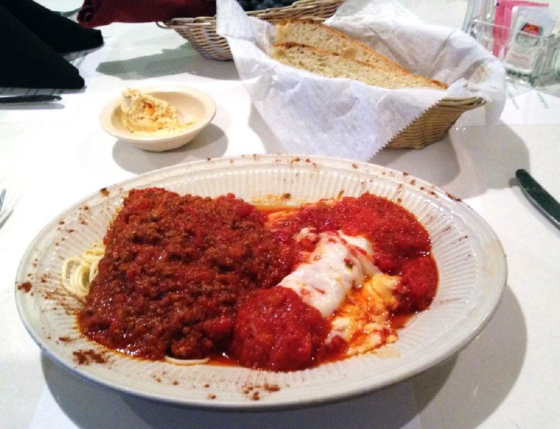 Spaghetti and meat sauce (left) and manicotti pair for a $6.95 Thursday lunch special at Bruno’s Italian Bistro on North Bowman Road. 