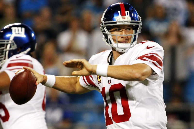 New York quarterback Eli Manning threw for 288 yards and one touchdown in the Giants’ 36-7 victory over the Carolina Panthers on Thursday in Charlotte, N.C. 