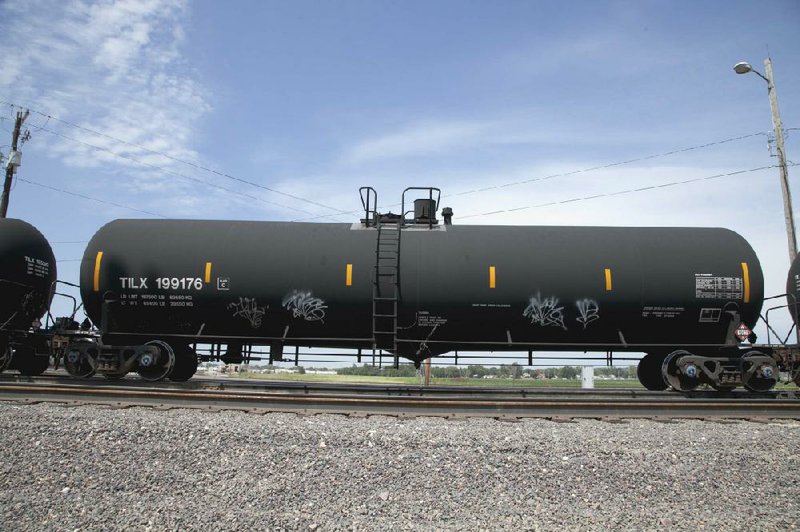 A DOT-111 rail tanker passes through Council Bluffs, Iowa, last month. Ethanol is now the highest-volume hazardous material shipped by rail. In 2000, it wasn’t even in the top 10. 