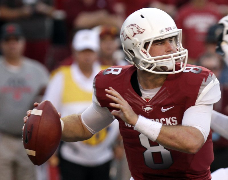 Arkansas quarterback Tyler Wilson passes during the first quarter of an NCAA college football game against Rutgers in Fayetteville, Ark., Saturday, Sept. 22, 2012.