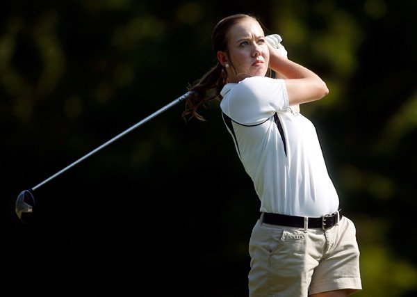 Brooke Rodney, Bentonville High senior, hits from the second tee on Aug. 28 during their match against Rogers Heritage High at Bella Vista Country Club.