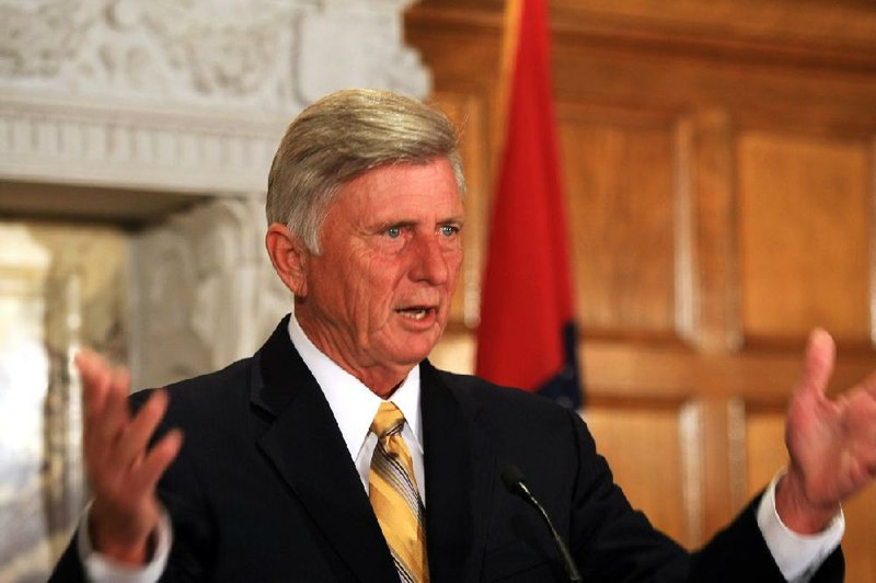 Arkansas Democrat-Gazette/ STATON BREIDENTHAL   --7/2/12--  Gov. Mike Beebe speaks Monday morning during a press conference at the sate Capitol about his recent trip to France. 