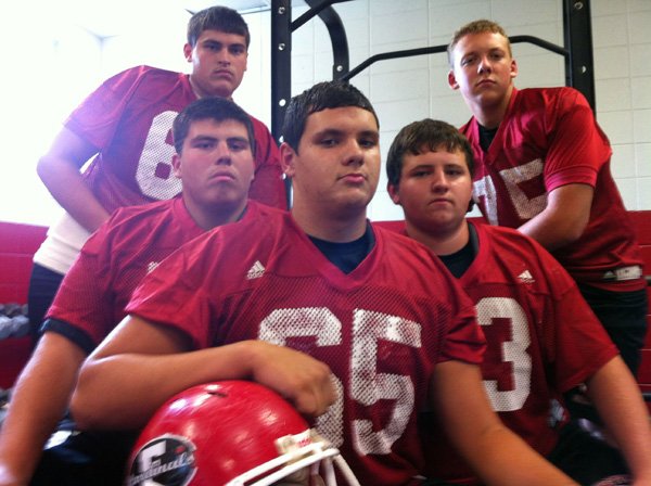 The Farmington Cardinals are off to a 4-0 start this season thanks to solid play by the offensive line. The offensive line is clockwise from bottom, Morgan Lewis, Jeremy Alexander, Michael Ryan, Zach Nickell and Hayden Sutton. The Cardinals take on Highway 62 rival Prairie Grove on Friday.