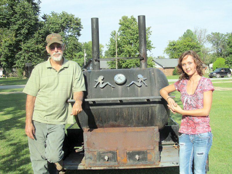 Ricky Gilmore is shown with his daughter Caitlin. Ricky is a multi-year winner of Jackson County’s Best Backyard Barbecue Contest, and Caitlin is a winner as well, both on her dad’s team and alone.
