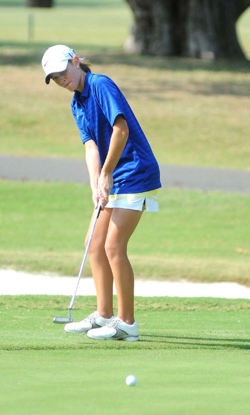 Hot Springs Lakeside’s Samantha Patrico watches a putt during Wednesday’s final round of the girls’ Class 5A state golf tournament on the Park Course at Hot Springs Country Club in Hot Springs. Patrico shot a 79 Wednesday to finish second individually and helped lead the Rams to the team title. 