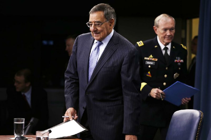 Defense Secretary Leon Panetta and Joint Chiefs Chairman Gen. Martin Dempsey arrive for a news conference at the Pentagon on Thursday. 