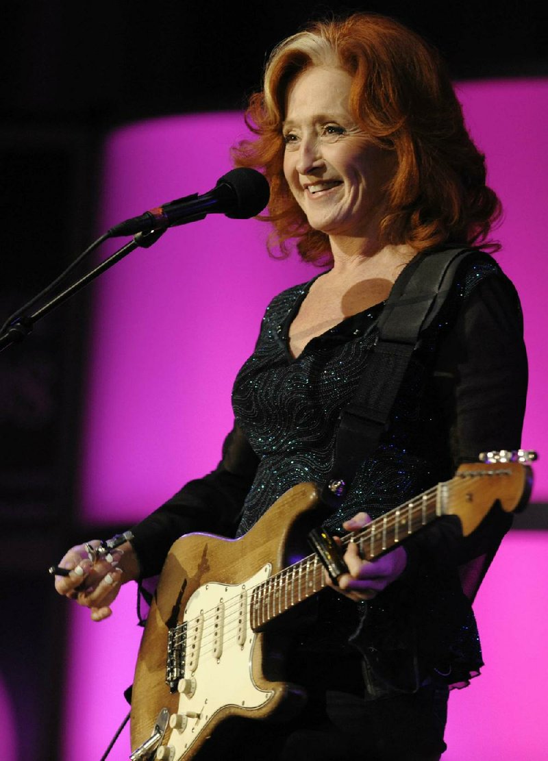 Bonnie Raitt performs at the King Biscuit Blues Festival on Saturday. 