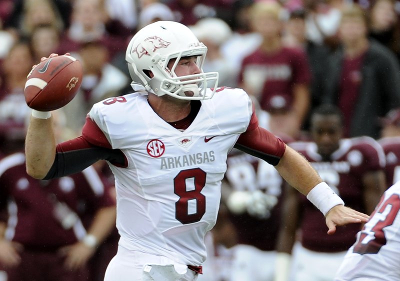 Arkansas quarterback Tyler Wilson prepares to pass during the first half of an NCAA college football game against the Texas A&M Saturday, Sept. 29, 2012, in College Station, Texas.