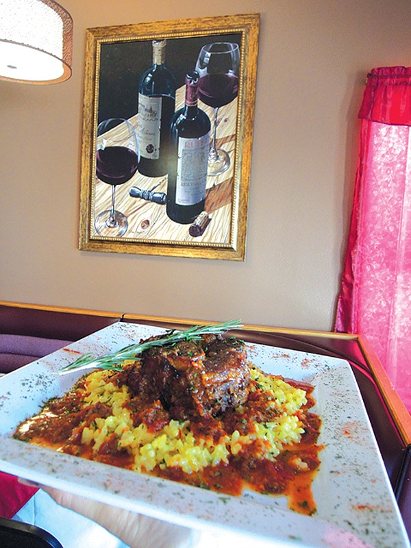 The lamb Ossobuco served at dinner is a lamb shank braised and slow cooked in red wine, italian herbs, and grated vegetables, served on a bed of saffron risotto.